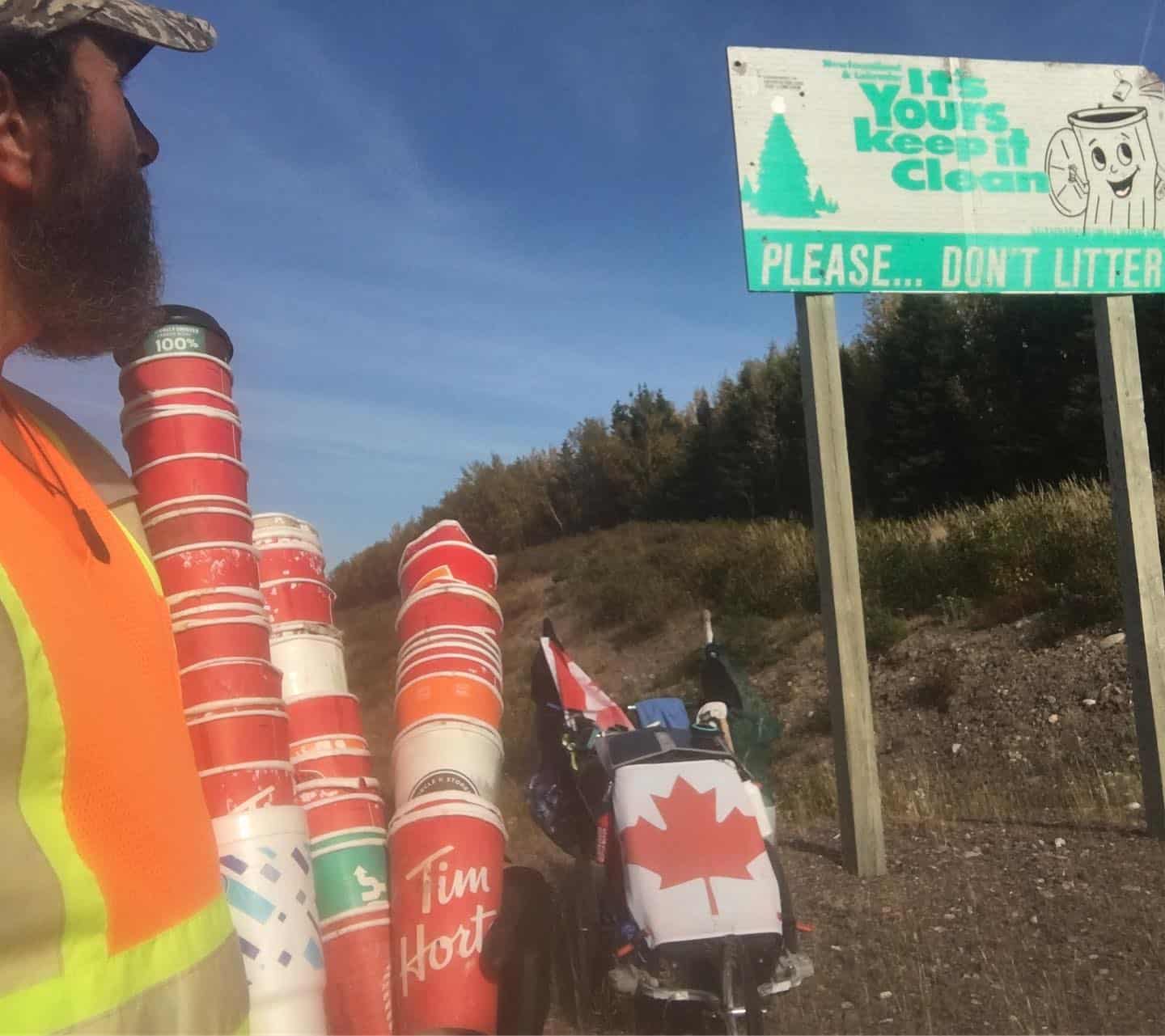 posters on the side of the road, run against plastics